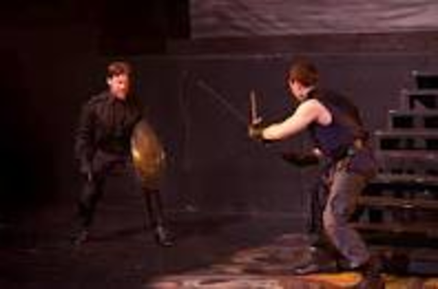 Macduff challenges Macbeth in a fight.