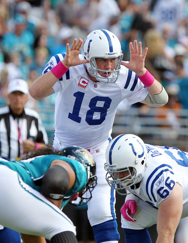 Introduces his signature no-huddle offense