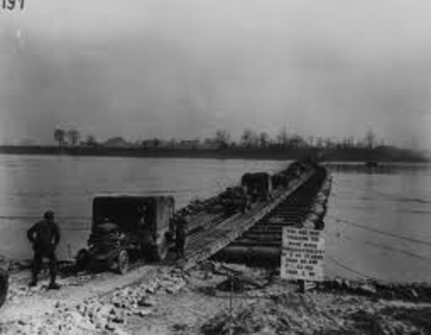 The U.S. troops cross the Rhine River.
