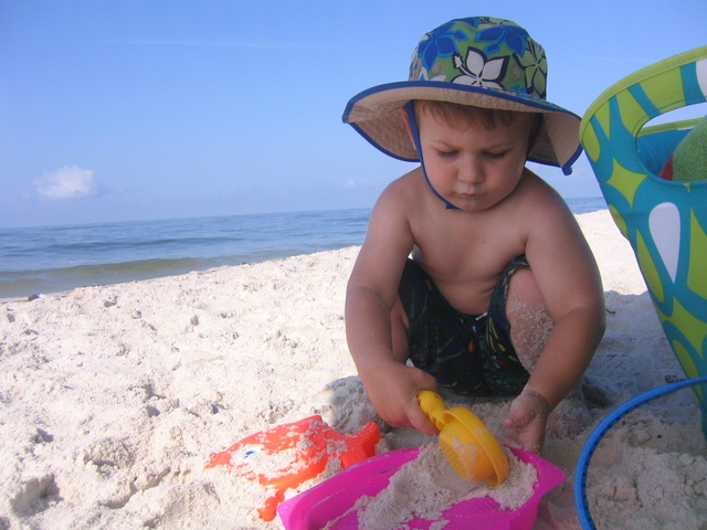 Parker goes to the beach at Dauphin Island, Alabama.