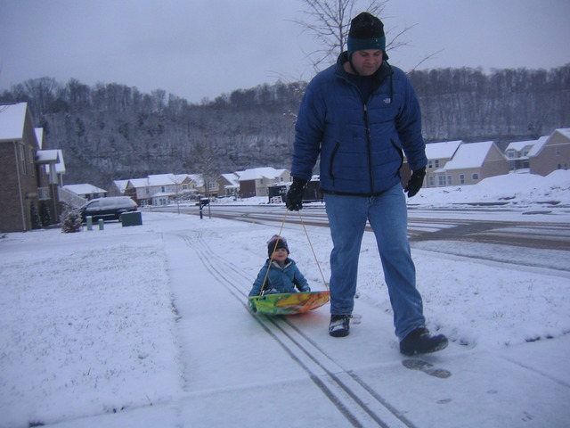 Parker goes sledding.
