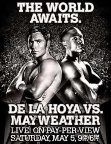 Earns a split-decision victory over De La Hoya in the richest pay-per-view boxing event ever.