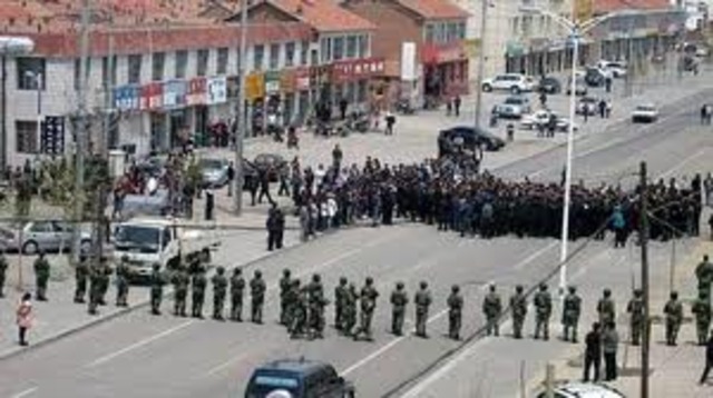 China's under martial law:  China declares martial law, enabling them to use force of arms against protesting students to end the Tiananmen Square protests.