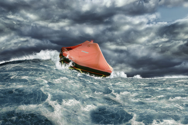 Phillip wake up on a life raft with a negro man and a black cat