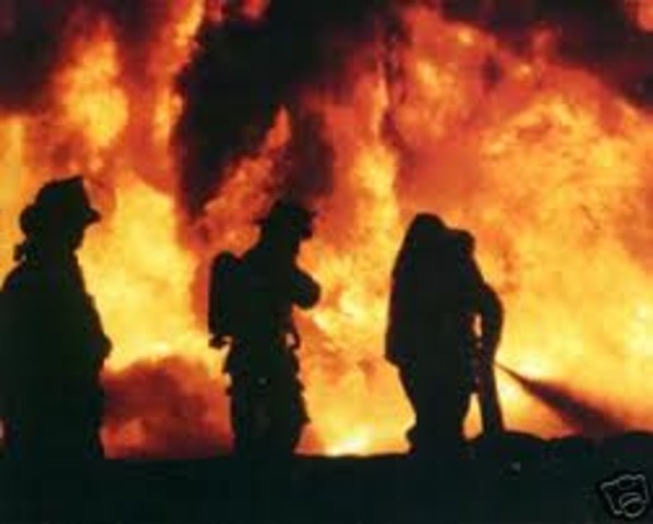 Nine Charleston, South Carolina firefighters are killed by a roof collapse while battling a furniture store fire on this day in history.