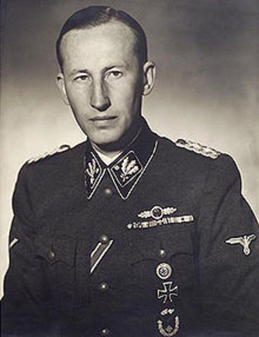 SS Leader Heydrich holds the Wannsee Conference to coordinate the "Final Solution of the Jewish Question."