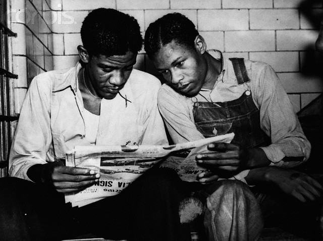 Norris Returns to Prison