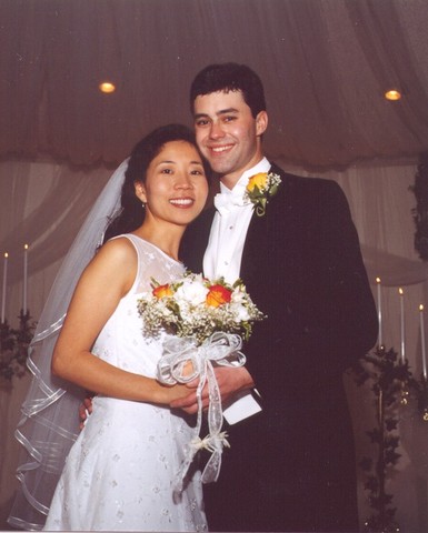 Marries Joel David Wells