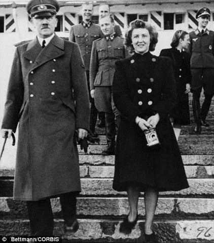 Hitler commits suicide with wife Eva Braun