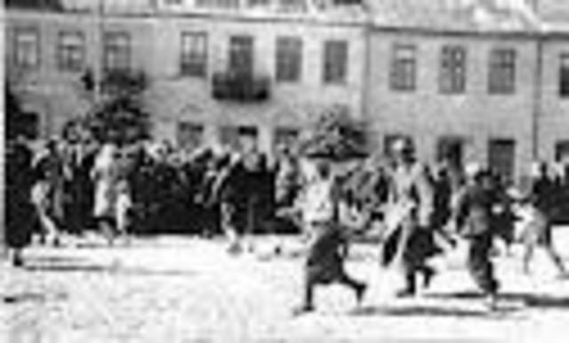 Jews forced to run to get to wagons with 40 pound packs on their backs