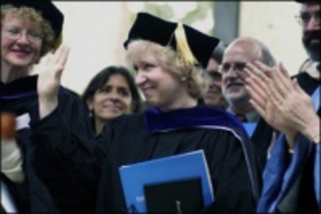 Kim graduates with a BA in political science