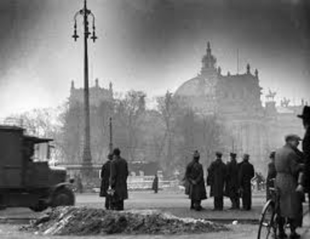 Hitler tells the Reichstag that other countries say they mistreat Jews.