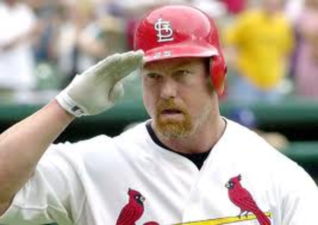 Mark McGwire and Sammy Sosa surpass Roger Maris' single-season home run record.