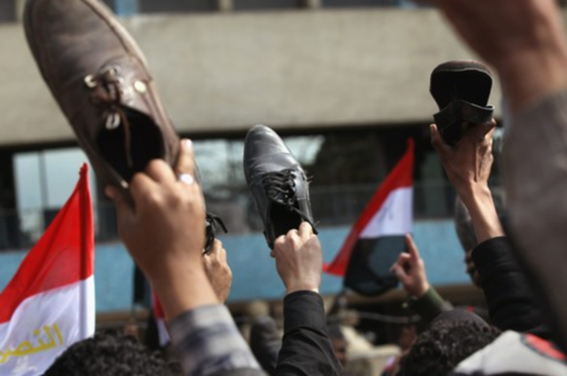 Hosni turns over power