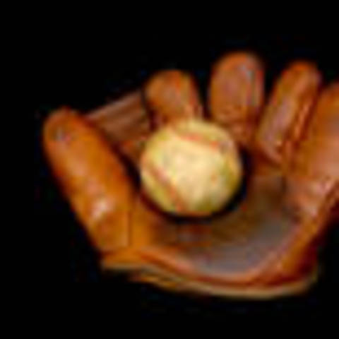 Charles Waitt wears first glove