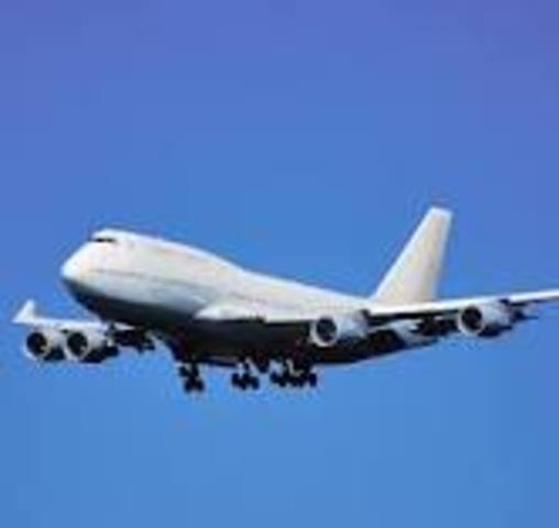 Canada's first powered air flight takes place at Baddeck, N.S.