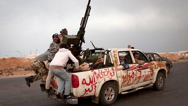 Gaddafi accuses the rebels