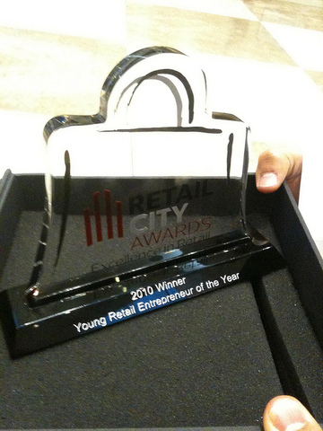 Chain Store Age Executive names Edward Stack Retail Entrepreneur of the Year; company name is changed to Dick's Sporting Goods.