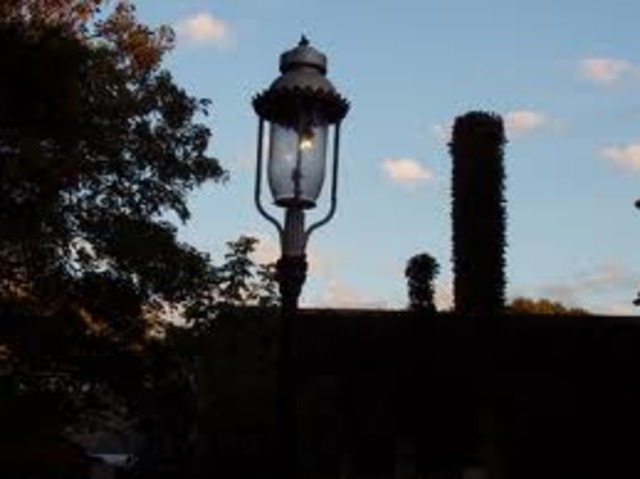 Gas street lighting common in Britain.