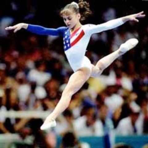 Dominique Moceanu competes in the senior national championship