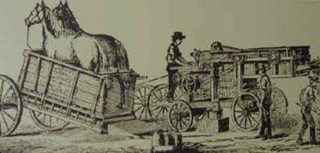 First Threshing Machine