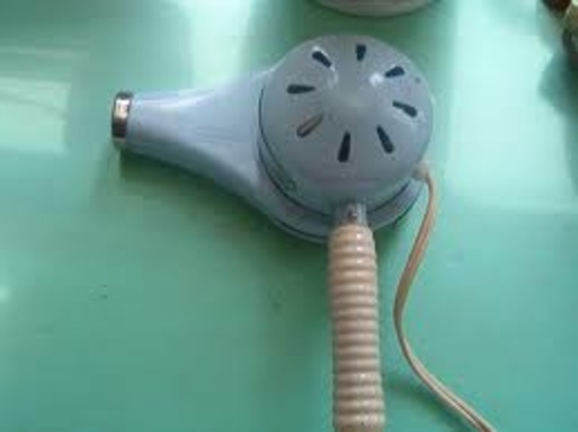 The first electric hair dryer was invented