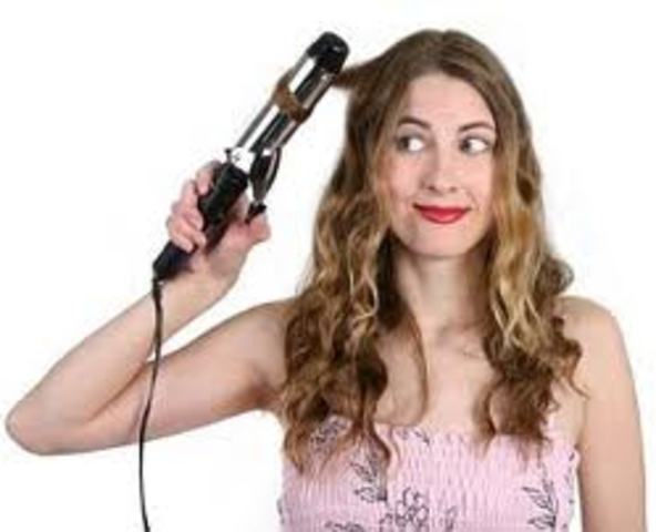 The pressing/curling iron was patented