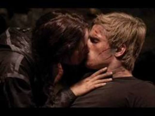 Peeta kisses Katniss  kf4554