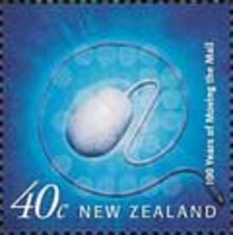 New Zealand issues a 40-cent postage stamp depicting a personal computer mouse, part of a series for the 100th anniversary of penny universal postage.