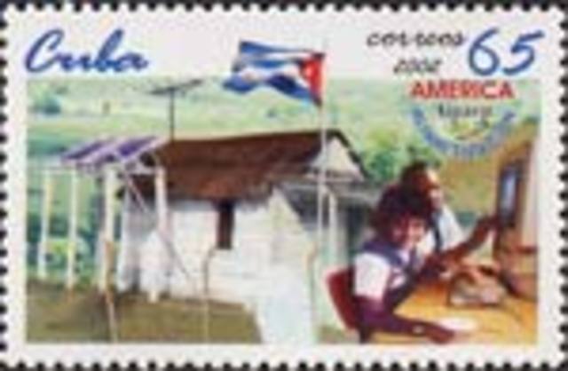 Cuba issues a 65 centavos postage stamp depicting children using a personal computer