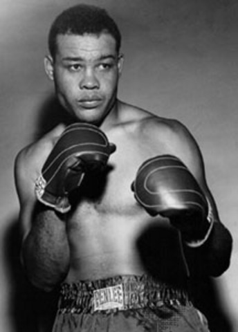 Sports and Mucis: Joe Louis Upsets boxing world