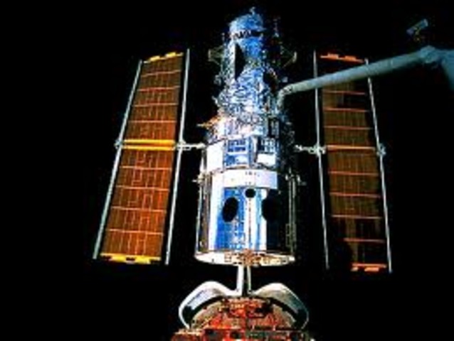 Space Shuttle Dicovery goes on a servicing mission for Hubble Space Telescope