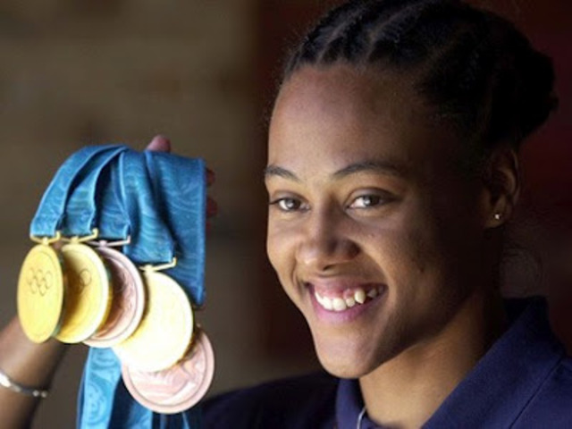 Marion Jones Wins it All