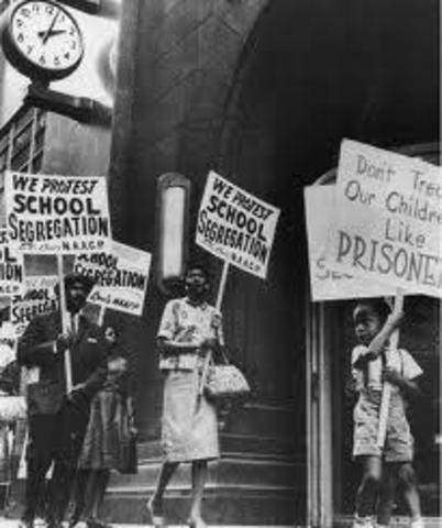 World Events: Segregation Ruled Illegal in U.S.
