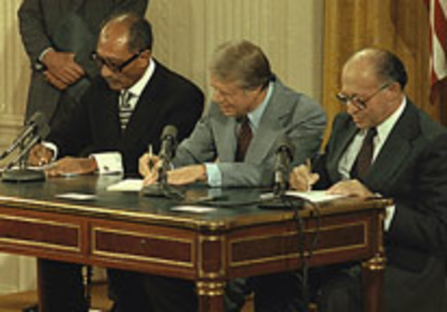 Carter helps negotiate the Camp David Accords