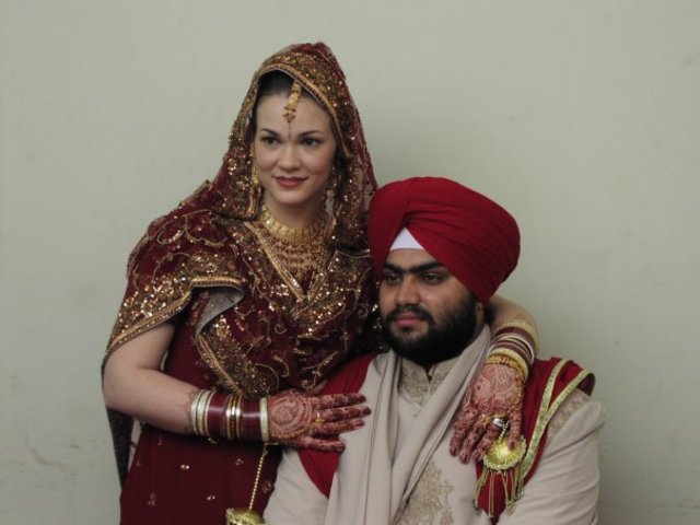 Traveled to India to have wedding ceremony in my husband's home (psychosocial)