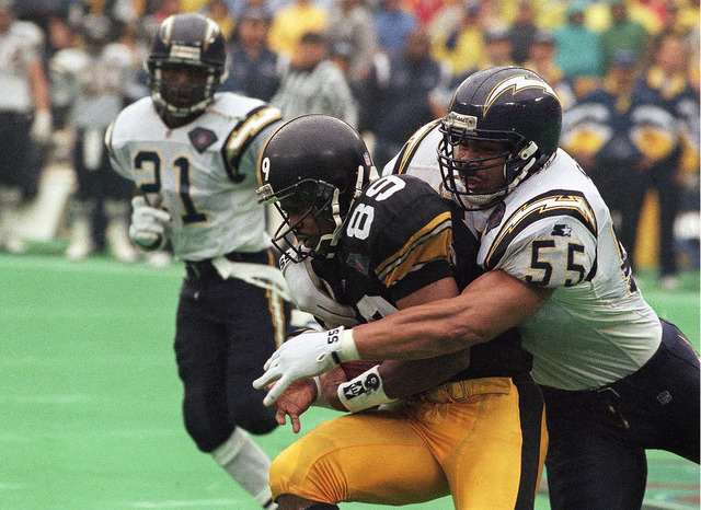 Seau helps the Chargers win first AFC championship