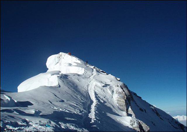 They start going down Mountain Everest.