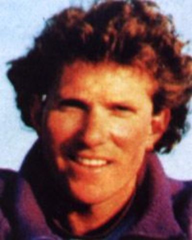 Andy Harris dies when he walks off a cliff and falls 4,000 ft. when he returns from summit