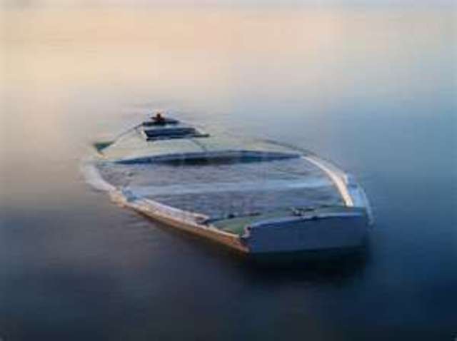 A boat flips in the Columbia River. Sacagawea saves important papers.