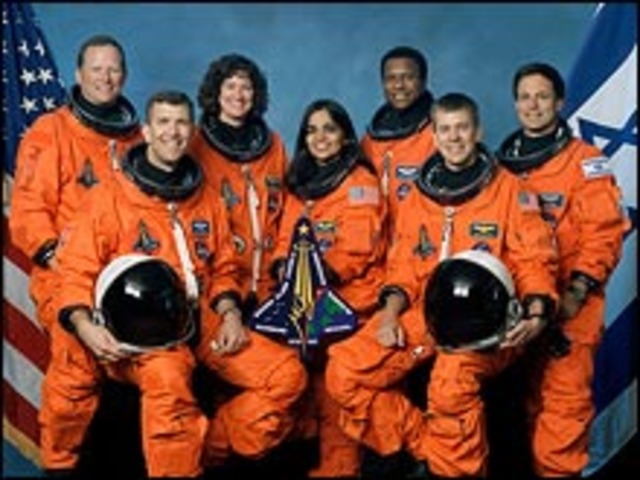 Space shuttle Columbia explodes