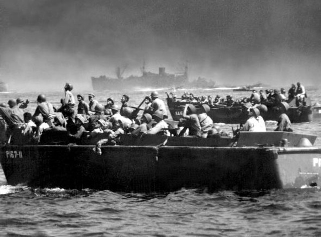 U.S. troops land in the Philippines.