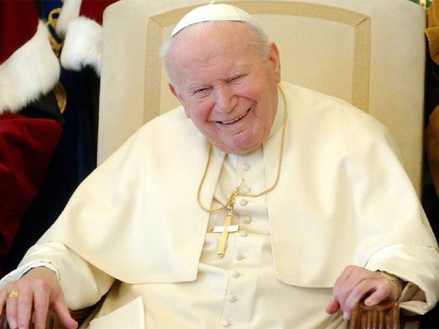 Meets with George W. Bush