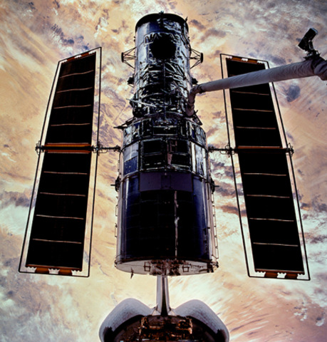 The crew of the space shuttle Discovery launched the hubble space telescope into orbit.