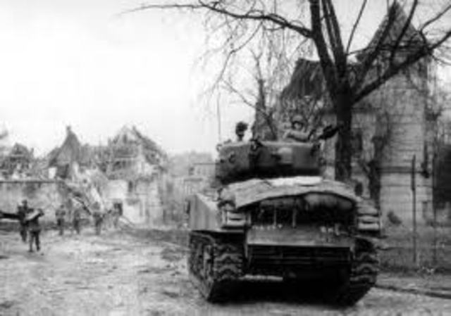 Allied forces land in southern France near Nice.