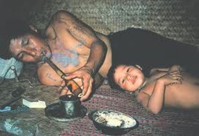 The Dutch introduce the practice of smoking opium