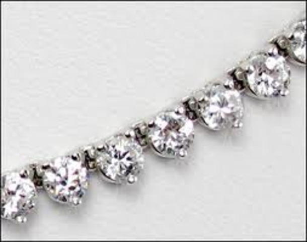 Madame Bonacieux is saved by D'Artagnan.