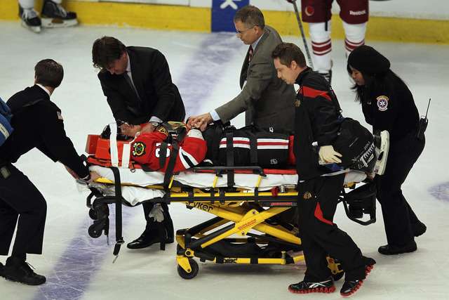 Hossa suffers possible concussion