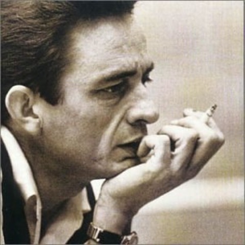 Johnny Cash signed with Columbia Records