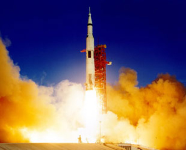 First manned lunar orbit.